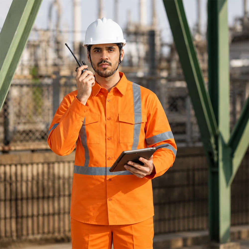 Safety compliance equipment including hard hat, gloves, and protective gear by Sona Signature