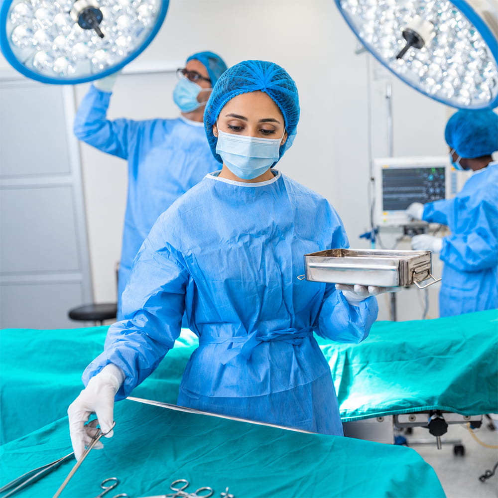 Surgical staff wearing scrub suits in an operation theatre uniform
